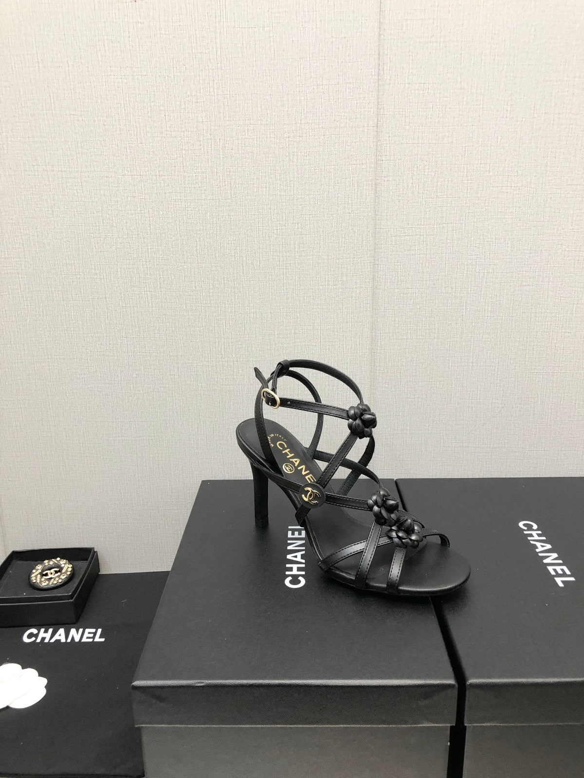 CHANEL FLORAL HIGH HEEL SANDAL IN BLACK LAMBSKIN