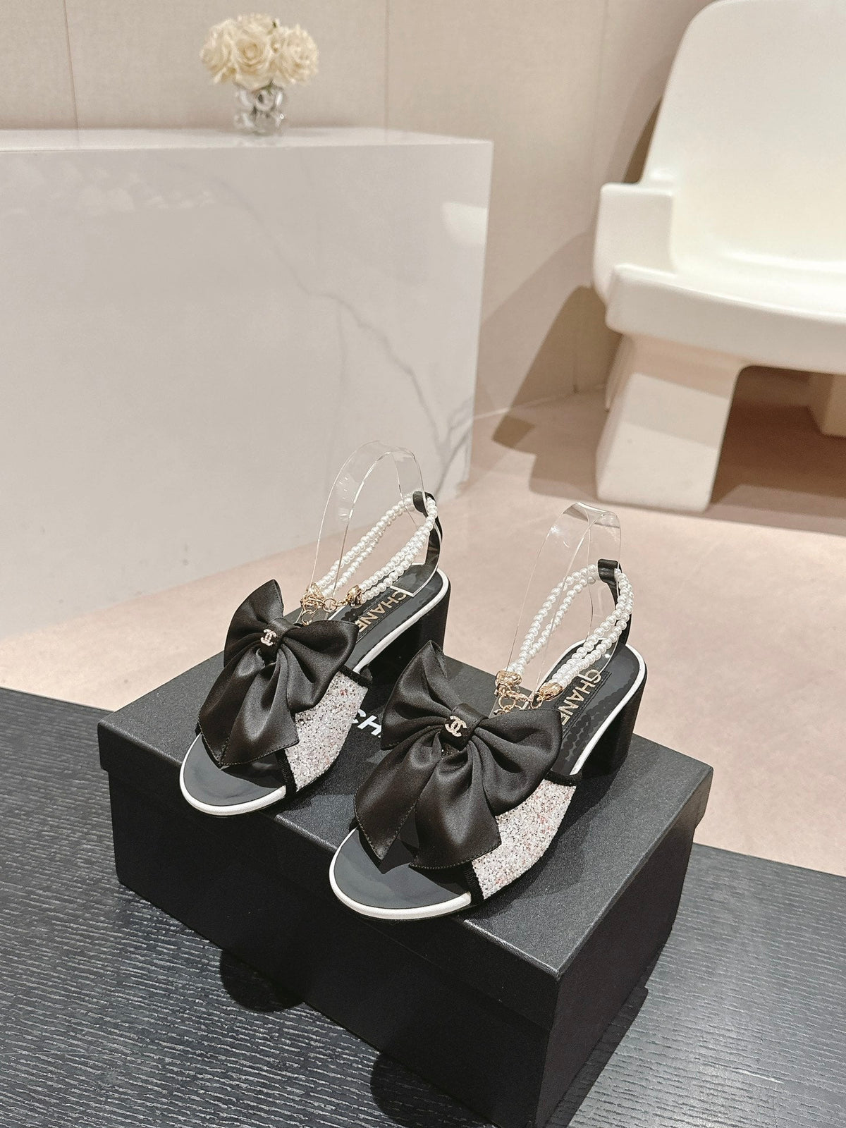 CHANEL HIGH SANDAL WITH PEARL CHAIN BLACK LAMBSKIN WITH WHITE RHINESTONES